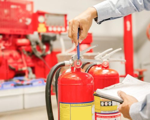 02-engineer-inspection-fire-extinguisher-fire-hoseready-use-event-firesafety-first-concept_545582-1484